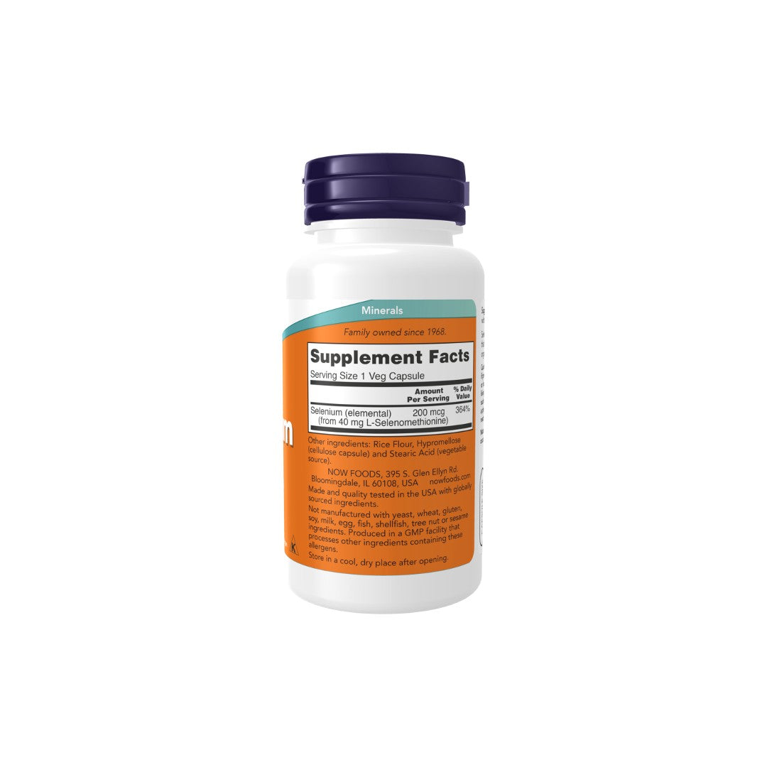 A plastic bottle of Now Foods Selenium 200 mcg 90 Veg Capsules, with a white label showcasing nutritional information and ingredients, including Selenium 200 mcg for thyroid hormone production.