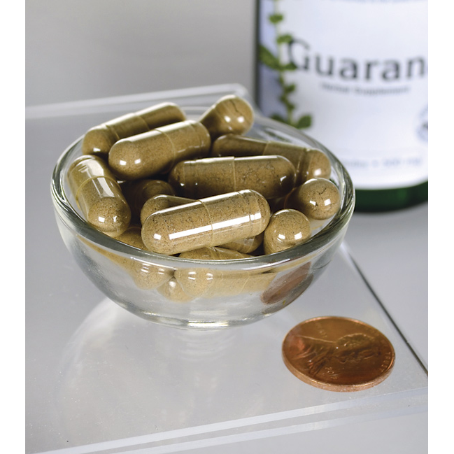 Swanson Guarana - 500 mg 100 capsules in a bowl next to a bottle.
