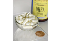 Thumbnail for Swanson DHEA - 100 mg 60 capsules in a bowl next to a penny.