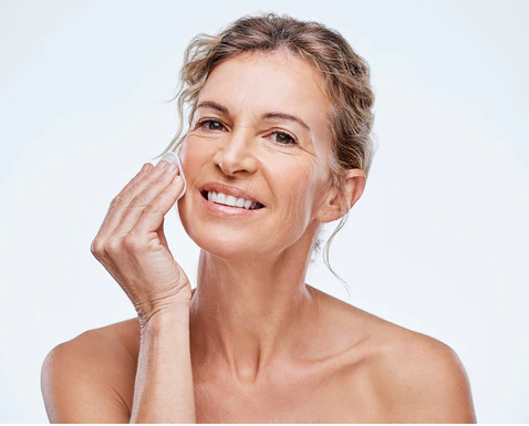 Aging Woman Doing Skincare Routine