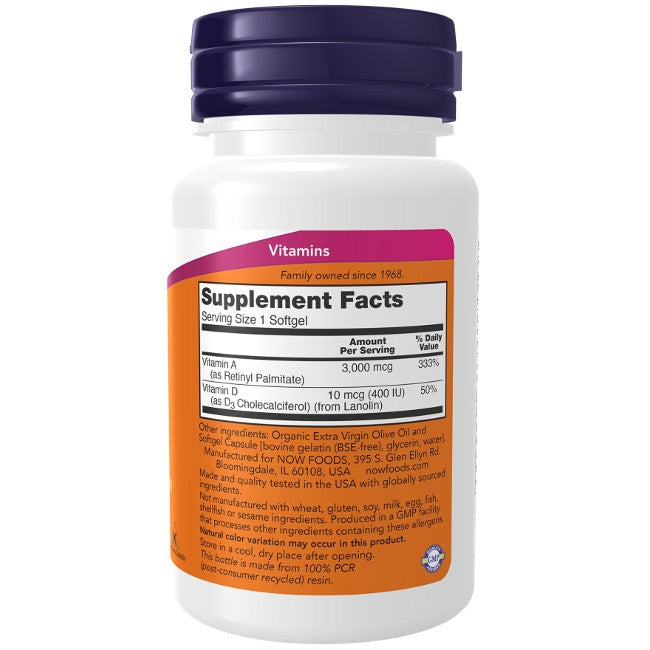 A white bottle of Now Foods Vitamin A & D 10,000/400 IU 100 Softgels with a purple cap displays supplement facts and ingredients, formulated to support immune function and bone health.