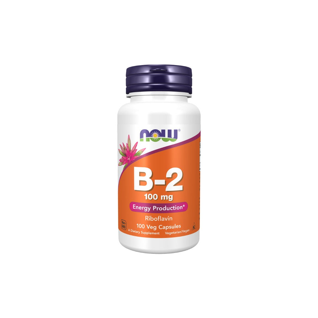A bottle of Now Foods Vitamin B-2 100 mg riboflavin supplements, containing 100 veg capsules, for energy production.