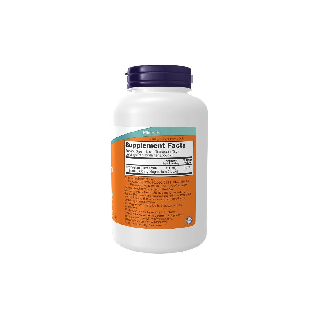 A white supplement bottle with an orange label displaying nutritional information for Now Foods Magnesium Citrate Pure Powder 227 g.
