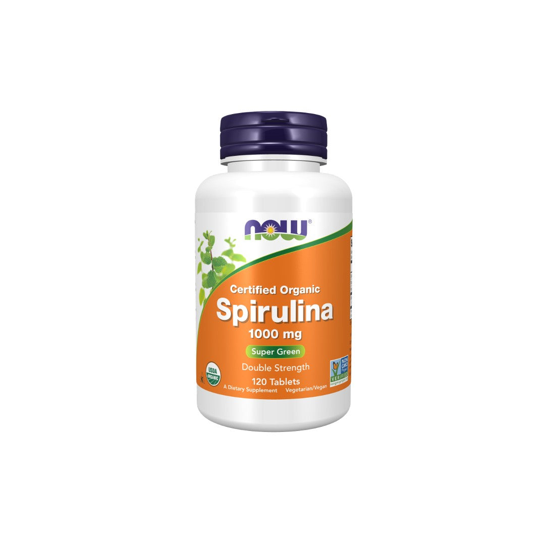A bottle of Now Foods Organic Spirulina Double Strength tablets, 1000 mg, labeled as super green and double strength, containing 120 tablets with immune system support.