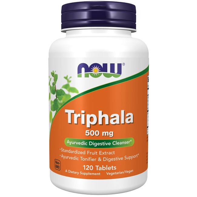 A bottle of Now Foods Triphala 500 mg 120 Tablets dietary supplement, labeled as an ayurvedic digestion support cleanser with vegetarian/vegan tablets.