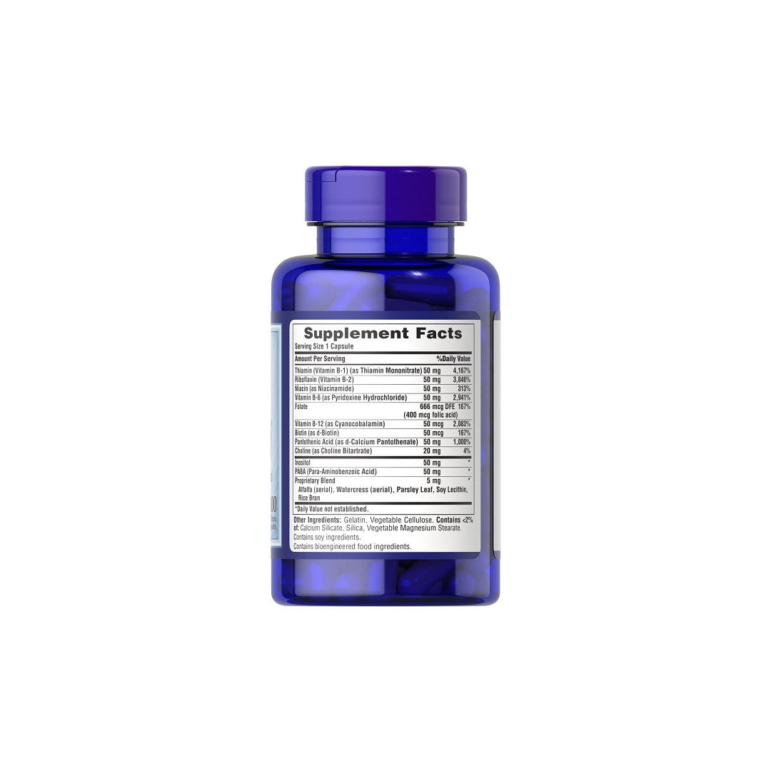 A bottle of Puritan's Pride Vitamin B-50 Complex 100 Rapid Release Capsules on a white background, promoting cardiovascular health and mental health benefits.