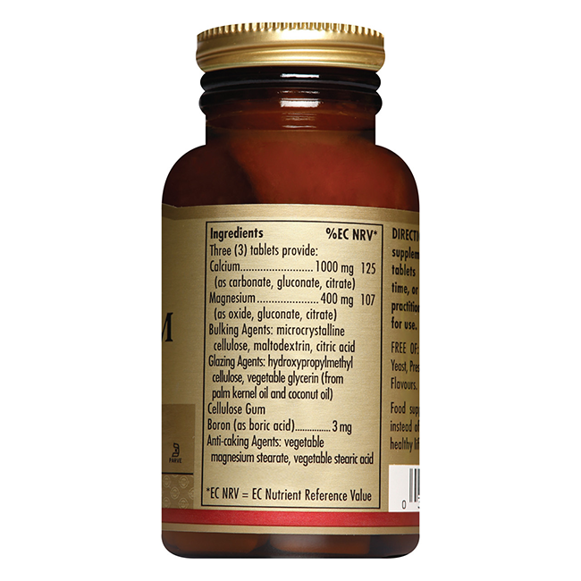 A brown Solgar bottle labeled "Calcium Magnesium plus Boron 100 Tablets" displays ingredients and nutritional info, including calcium, magnesium, boron, and various additives and bulking agents.