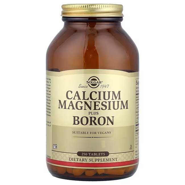 Solgar Calcium Magnesium plus Boron 250 Tablets is a dietary supplement in a brown bottle that supports bone health and is suitable for vegans.
