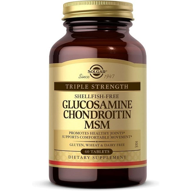 A bottle of Solgar Triple Strength Glucosamine Chondroitin MSM supplements for joint support, indicating it is shellfish-free and contains 60 tablets.