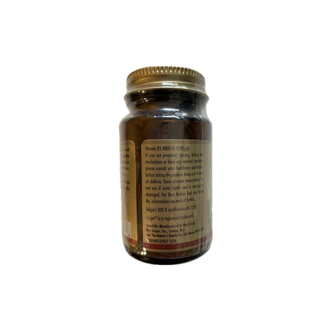 A small glass jar with a gold lid, displaying nutritional information and Solgar Vitamin D3 (Cholecalciferol) 4000 IU 100 mcg content on its label, isolated on a white background.