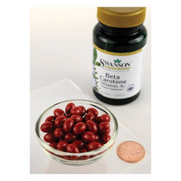 Thumbnail for A bowl of red capsules sits next to a Swanson Beta-Carotene (Vitamin A) 10000 IU 250 Softgels bottle, highlighting vision and skin health benefits, with a penny for size reference.