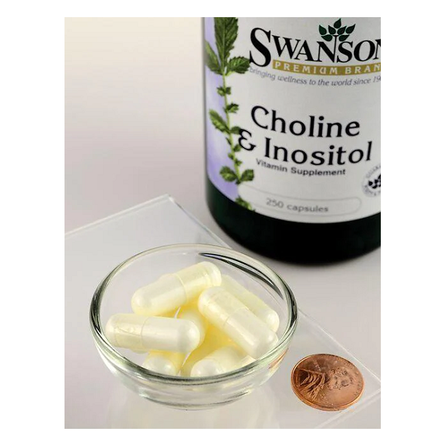 A bowl of white capsules is next to a penny, in front of a Swanson Choline & Inositol 250 Capsules bottle. This powerful blend is formulated for mood support, providing essential nutrients to help you feel your best.