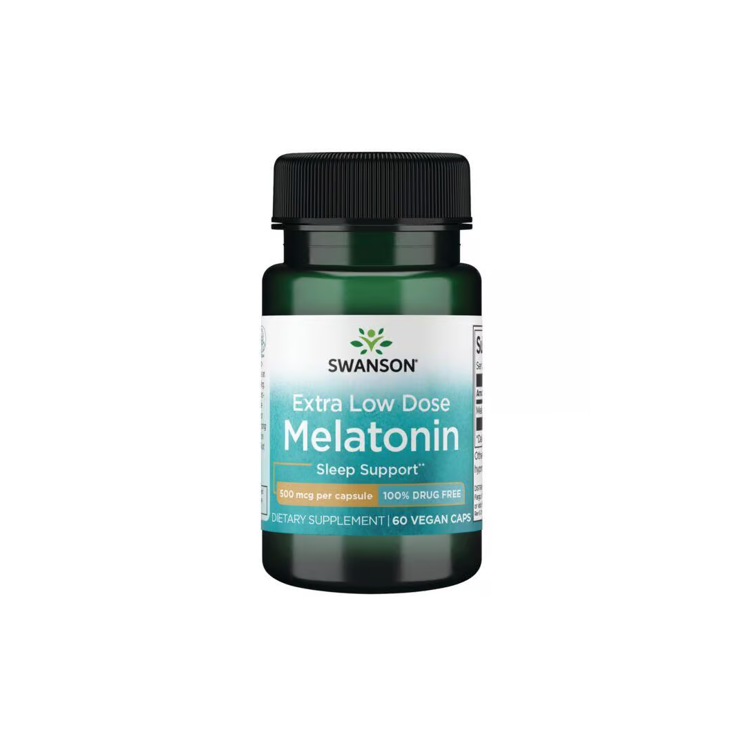 Swanson's Extra Low Dose Melatonin, with 500 mcg per capsule, provides sleep support in a green bottle of 60 veggie capsules, ideal for combating jet lag.