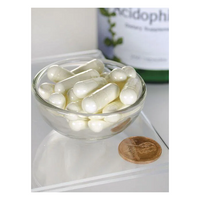 Thumbnail for A small Swanson glass bowl with white capsules next to a penny highlights their size, suggesting digestive health benefits. A blurred Lactobacillus Acidophilus - 250 capsules bottle can be seen in the background.