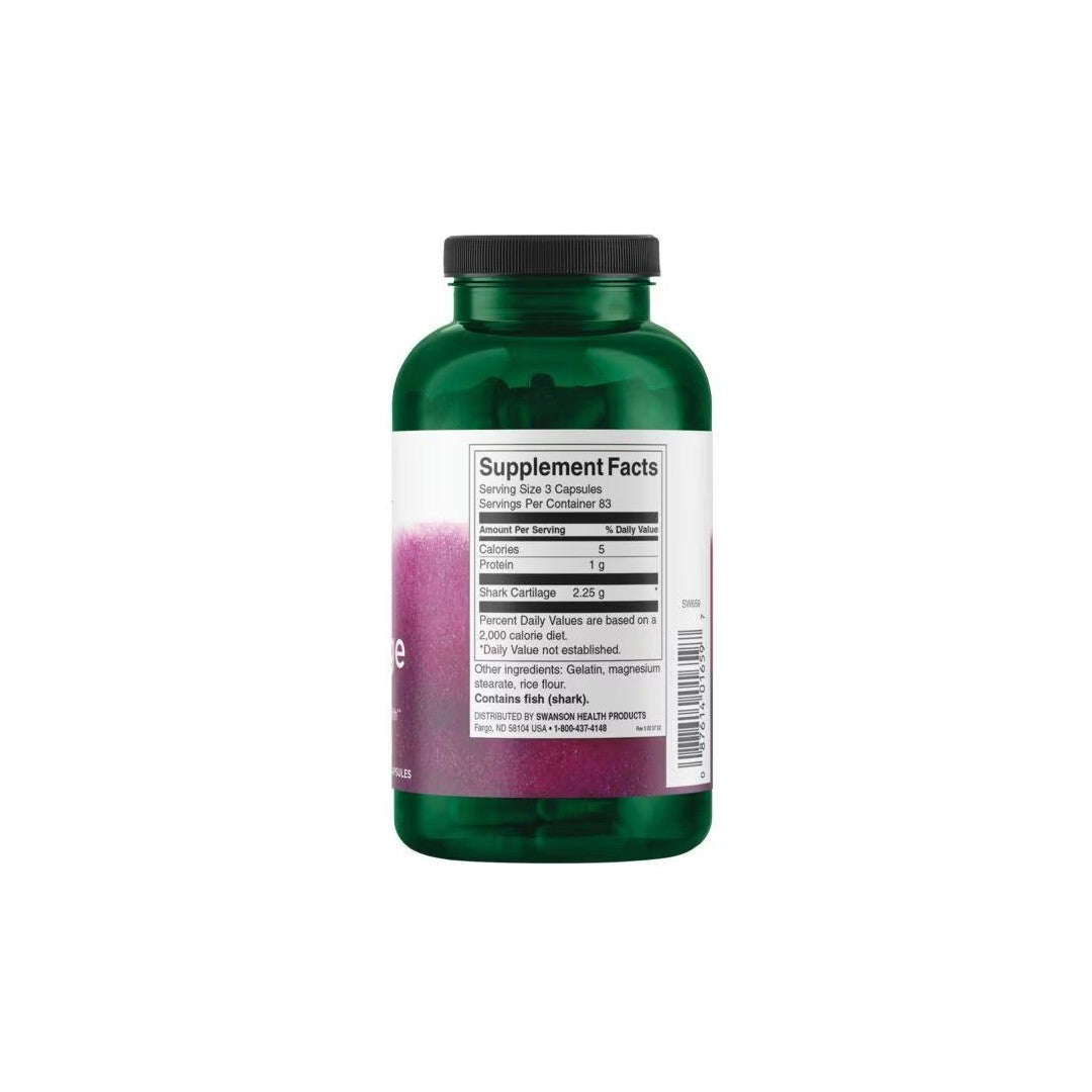 A green bottle with a label listing supplement facts, including serving size, nutritional information, and ingredients for Swanson's Shark Cartilage 750 mg 250 Capsules dietary supplement designed to support joint health.
