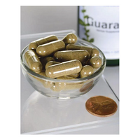 Thumbnail for A glass bowl contains Swanson's Full Spectrum Guarana 500 mg capsules, known for their caffeine content, next to a penny.