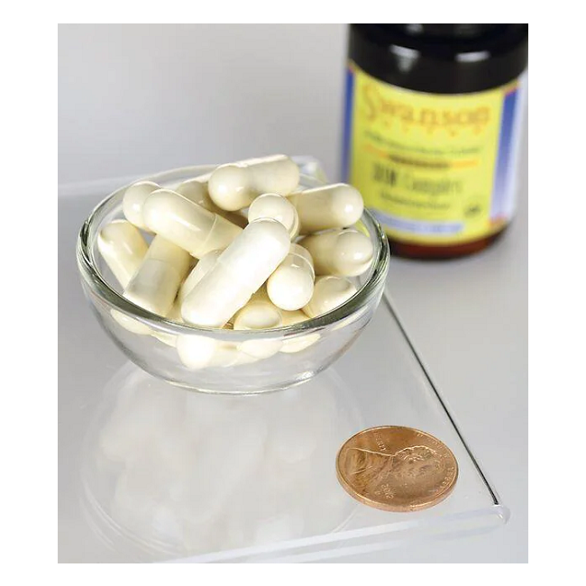 A small glass bowl filled with white capsules is next to a penny on a clear surface, with a partially visible bottle of Swanson's Super DHA 500 from Food-Grade Calamari, containing omega-3s, in the background.