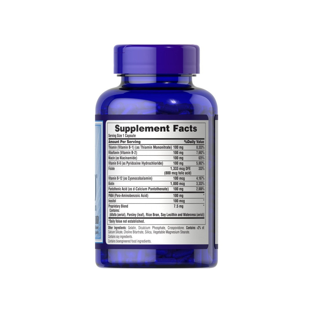 A bottle of Puritan's Pride Vitamin B-100 Complex 100 Rapid Release Capsules on a white background.