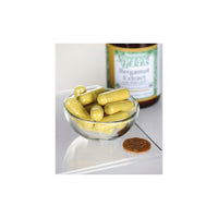 Thumbnail for Swanson dietary supplement 500 mg 30 vcaps in a bowl next to a bottle.