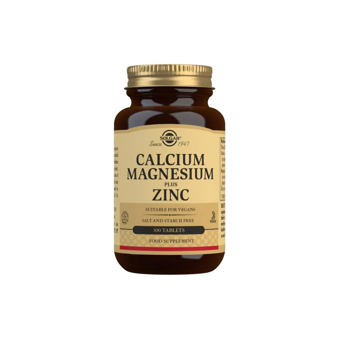 A dietary supplement bottle with 100 tablets of Solgar Calcium Magnesium Plus Zinc.