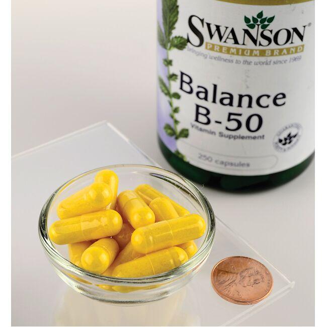 Product Description: A bottle of Swanson Vitamin B-50 Complex - 250 capsules, showcasing its potency and affordability with a penny juxtaposed for size comparison.