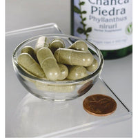 Thumbnail for A bottle of Swanson's Chanca Piedra - 500 mg 60 vege capsules in a glass bowl.