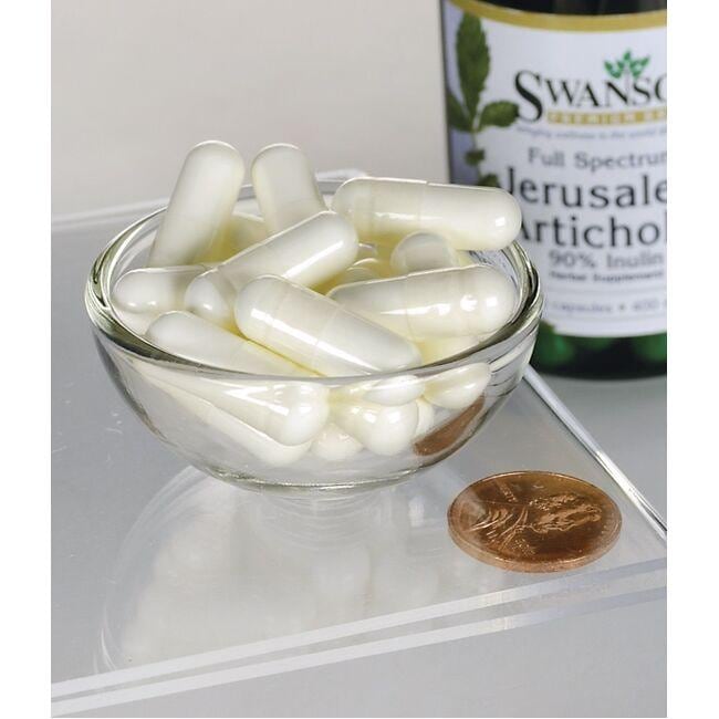 A bowl containing Swanson's Prebiotic Jerusalem Artichoke - 400 mg 60 capsules, an herbal supplement for digestive health.