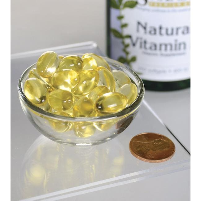 Swanson's Vitamin E - Natural 400 IU 250 softgel capsules in a bowl, providing antioxidant support and promoting cardiovascular health.