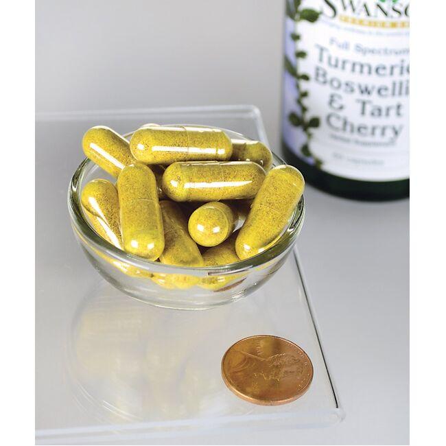 A bottle of Swanson Turmeric, Boswellia & Tart Cherry - 60 capsules on a table, containing Ayurvedic ingredients for joint support.