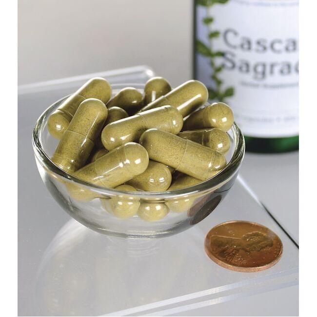 Swanson Cascara Sagrada - 450 mg 100 capsules in a bowl on top of a bottle.