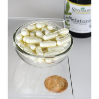 Thumbnail for Swanson Astragalus Root - 470 mg 100 capsules in a bowl next to a penny.