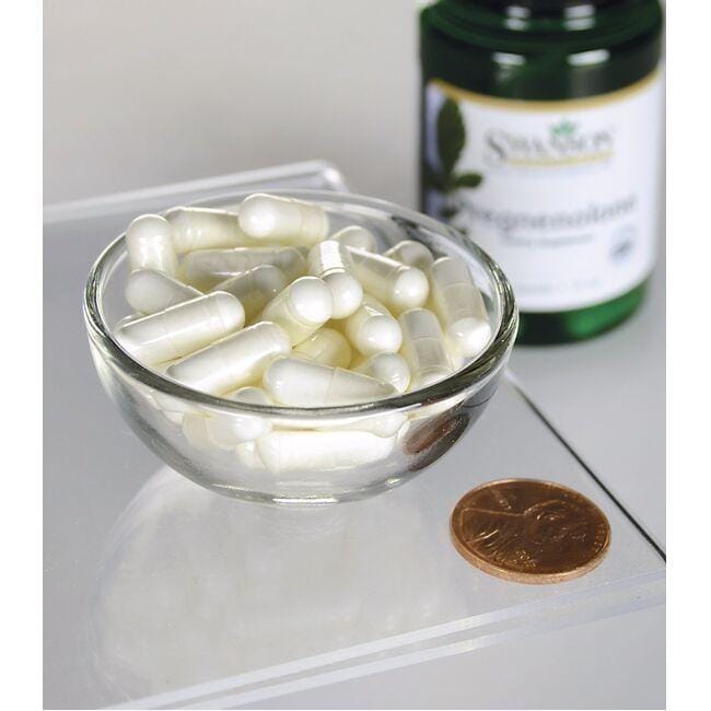 A bowl of Swanson high potency pregnenolone - 10 mg 90 capsules next to a bottle of ginkgo biloba.