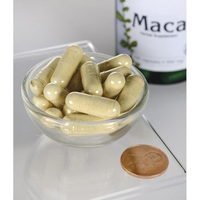 Swanson Maca - 500 mg 100 capsules in a bowl next to a bottle of Swanson Maca.