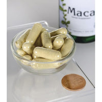 Thumbnail for Swanson Maca - 500 mg 100 capsules in a bowl next to a bottle of Swanson Maca.