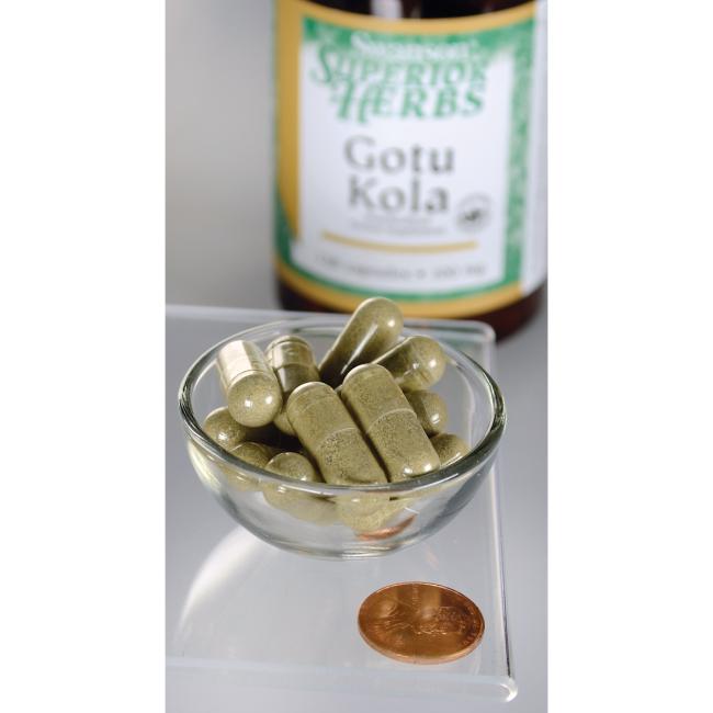 A bottle of Swanson Gotu Kola Extract - 100 mg 120 capsules sits next to a bowl.