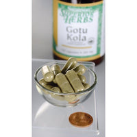 Thumbnail for A bottle of Swanson Gotu Kola Extract - 100 mg 120 capsules sits next to a bowl.