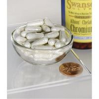 Thumbnail for A bowl of Swanson Chromium - 200 mcg 180 capsules Albion Chelated and a penny.