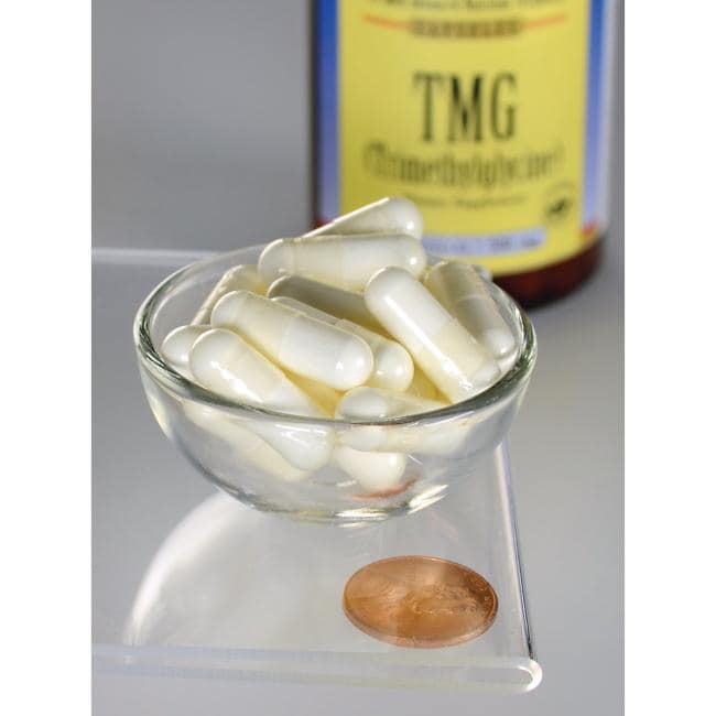 Swanson TMG Trimethylglycine capsules - 500 mg 90 capsules in a bowl next to a penny, promoting liver function.