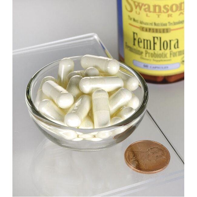 A bottle of FemFlora Probiotic for Women - 60 capsules by Swanson and a penny in a bowl.