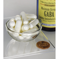 Thumbnail for A bowl of Swanson GABA - 750 mg 60 vege capsules next to a bottle of gaba.