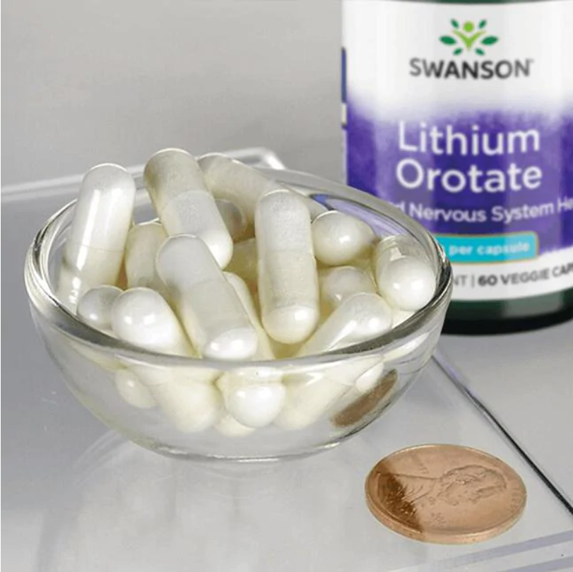 Swanson Lithium Orotate - 5 mg 60 veg capsules in a bowl next to a coin.
