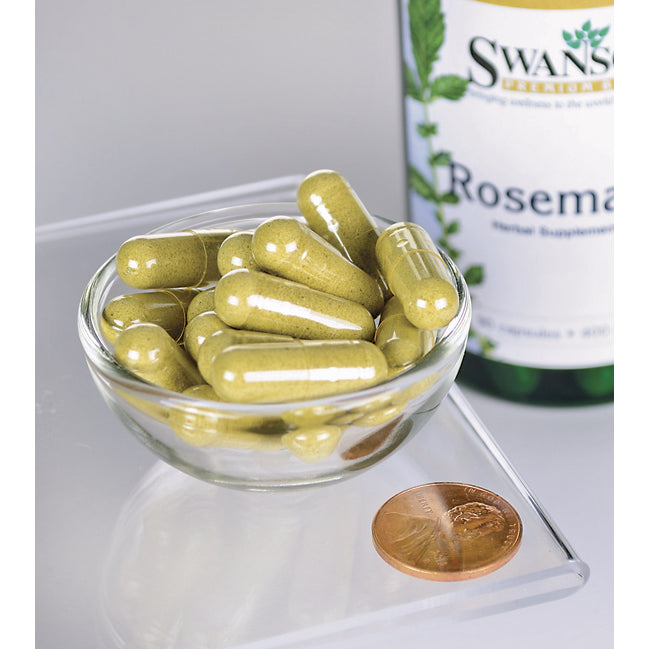 A bowl containing a bottle of Swanson Rosemary - 400 mg 90 capsules, an antioxidant-rich herb, and a penny.