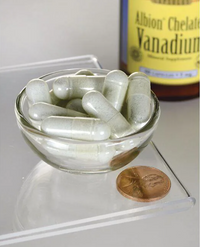Thumbnail for A bowl of Swanson Albion Vanadium Chelated - 5 mg 60 capsules next to a bottle of alcohol.
